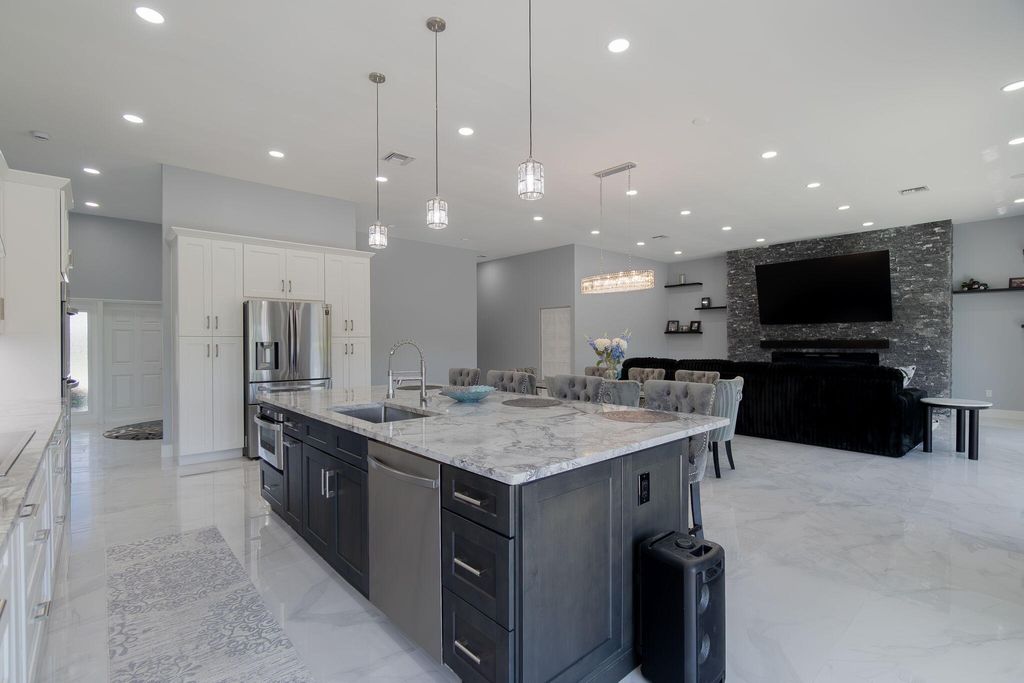 Photo of 13621 Barberry Drive, Wellington, FL 33414 (MLS # B26024366)