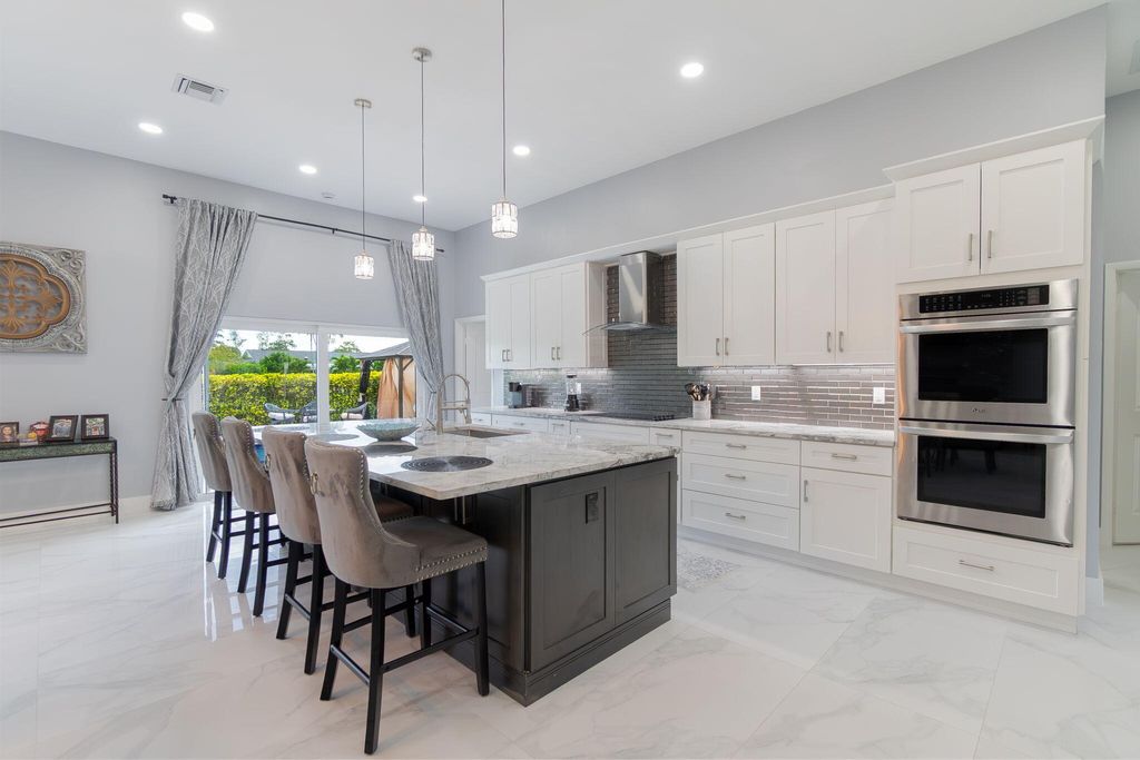 Photo of 13621 Barberry Drive, Wellington, FL 33414 (MLS # B26024366)