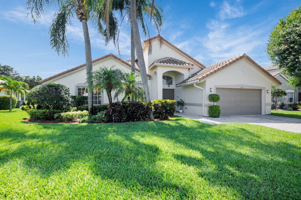Photo of 6000 Golf Villas Drive, Boynton Beach, FL 33437 (MLS # R11091498)