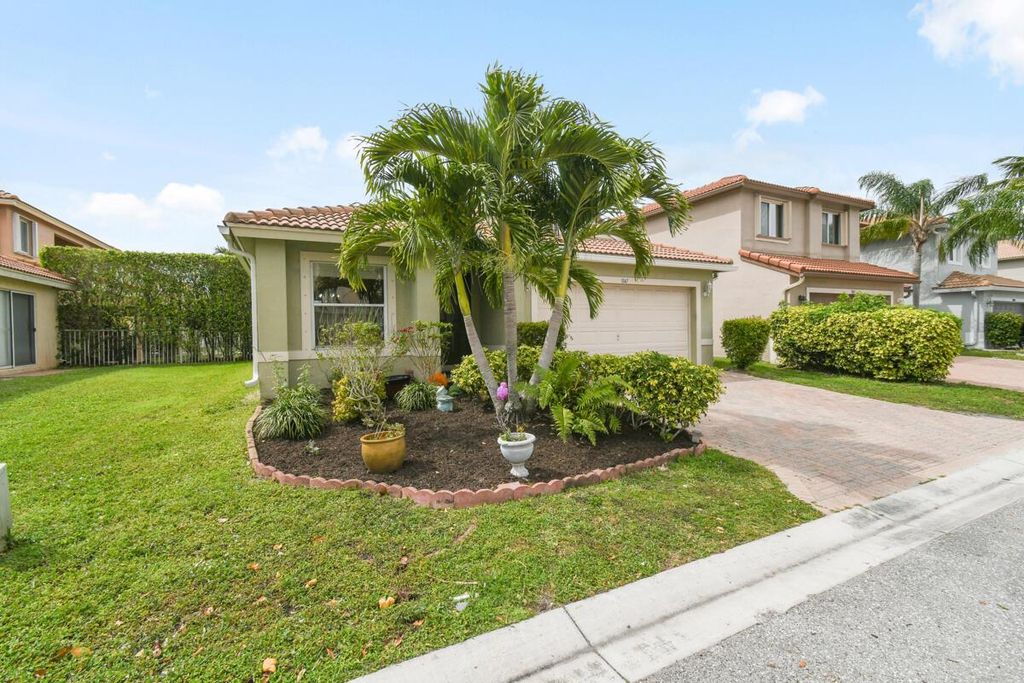 Photo of 1047 Big Torch Street, Riviera Beach, FL 33407 (MLS # R10965230)