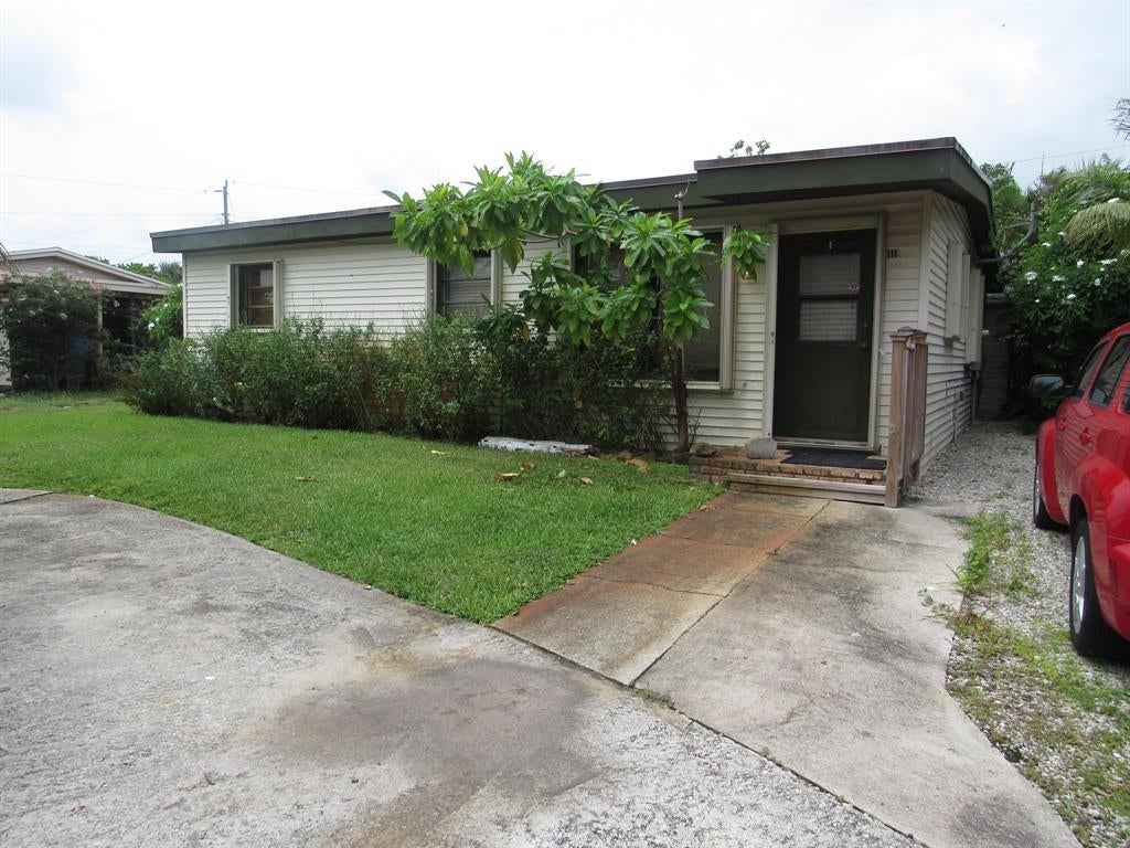 Photo of 1111 S 14th Place, Lantana, FL 33462 (MLS # R10747283)