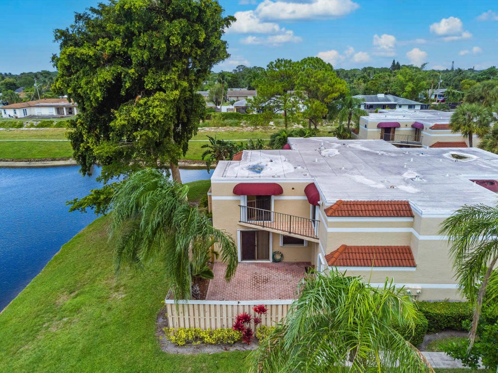 Photo of 4075 Village Drive #D, Delray Beach, FL 33445 (MLS # R11135718)