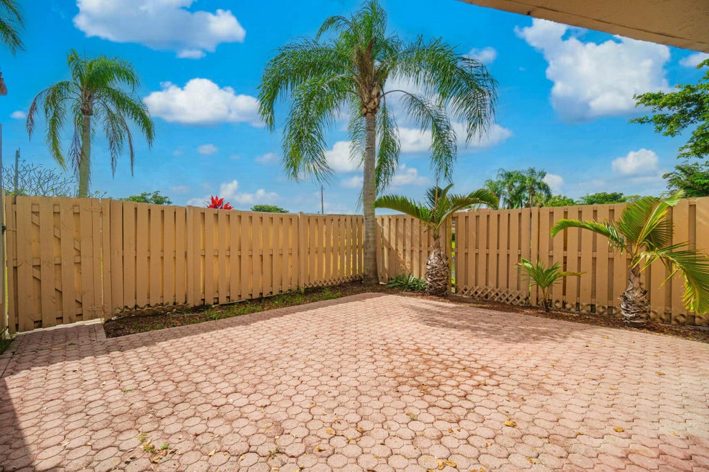 Photo of 4075 Village Drive #D, Delray Beach, FL 33445 (MLS # R11135718)