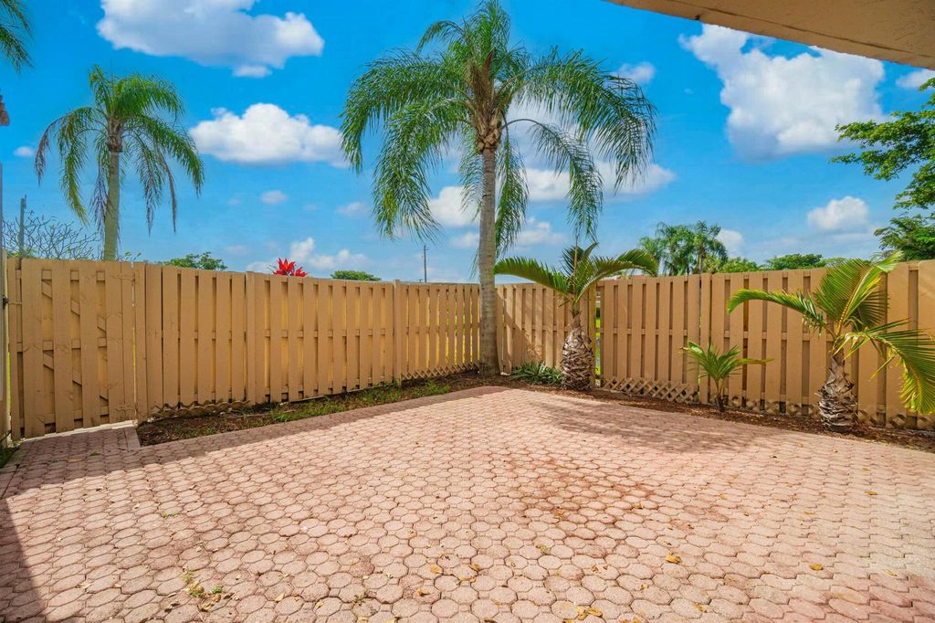 Photo of 4075 Village Drive #D, Delray Beach, FL 33445 (MLS # R11135718)