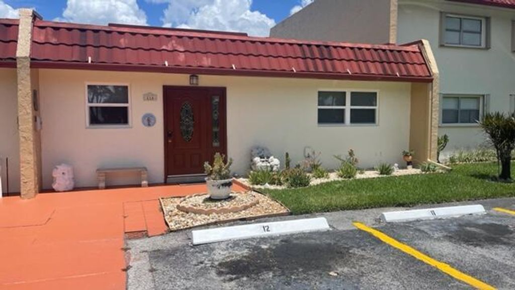 Photo of 116 Lake Dora Drive Dr, West Palm Beach, FL 33411 (MLS # R10810074)