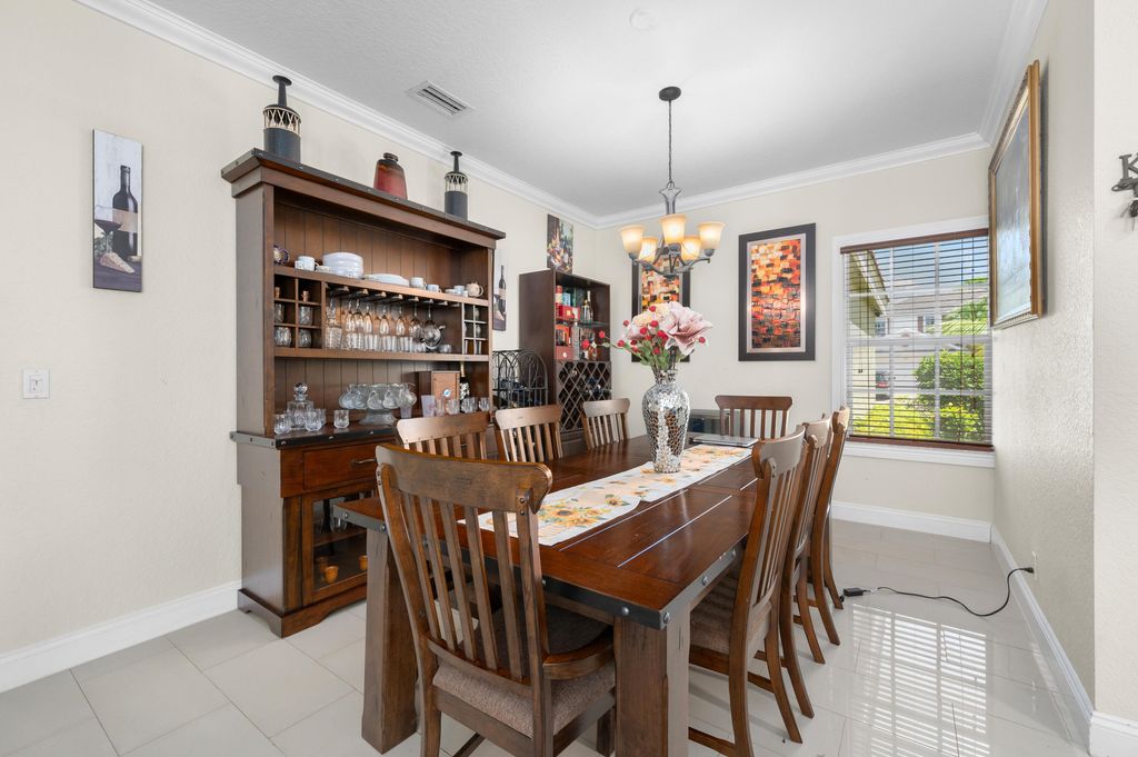 Photo of 311 Berenger Walk, Royal Palm Beach, FL 33414 (MLS # R11112196)