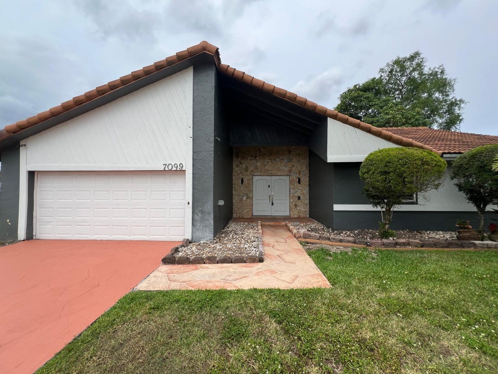 Photo of 7099 NW 48th Court, Lauderhill, FL 33319 (MLS # B26028661)