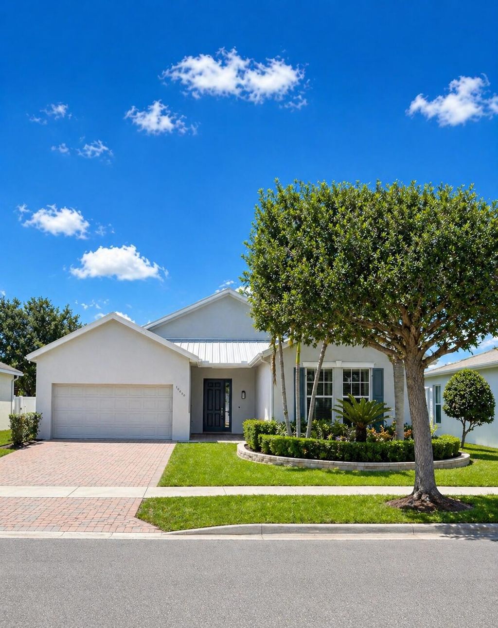 Photo of 10630 SW Waterway Lane, Port Saint Lucie, FL 34987 (MLS # B26020531)