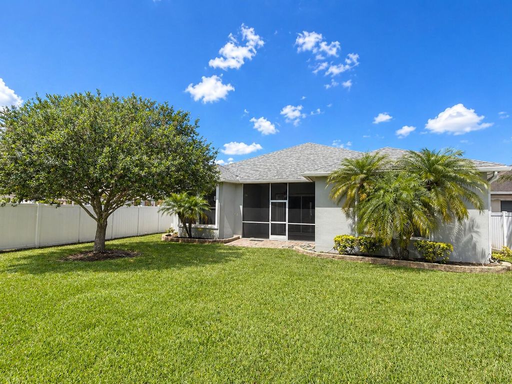 Photo of 10630 SW Waterway Lane, Port Saint Lucie, FL 34987 (MLS # B26020531)