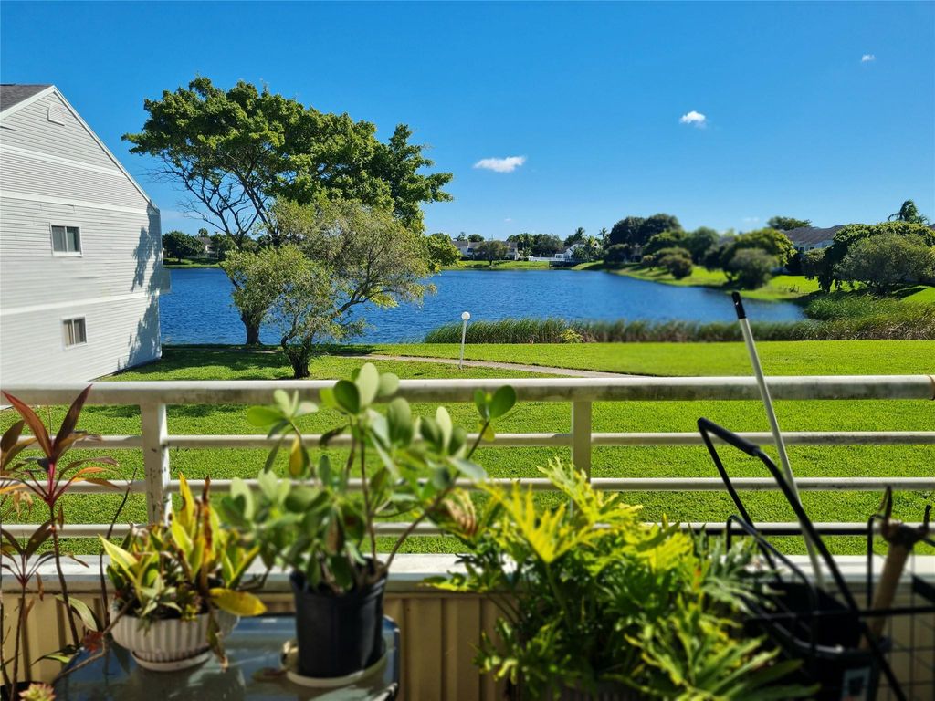 Photo of 3421 NW 44th St #203, Lauderdale Lakes, FL 33309 (MLS # F10532587)