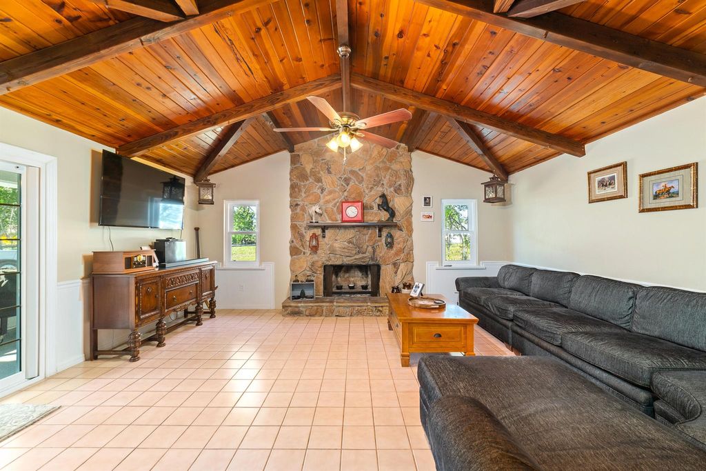 Photo of 411 SW Lucero Drive, Port Saint Lucie, FL 34983 (MLS # R10964026)