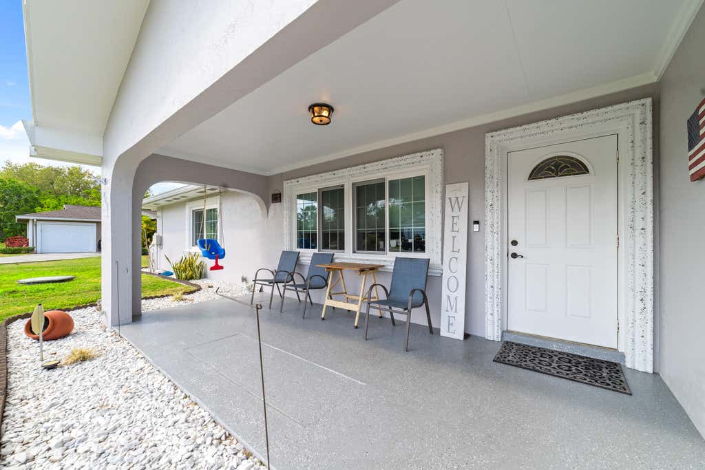 Photo of 411 SW Lucero Drive, Port Saint Lucie, FL 34983 (MLS # R10964026)