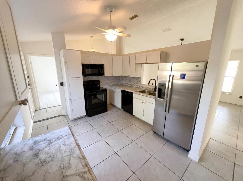 Photo of 4393 SW Calah Circle, Port Saint Lucie, FL 34953 (MLS # R11158209)