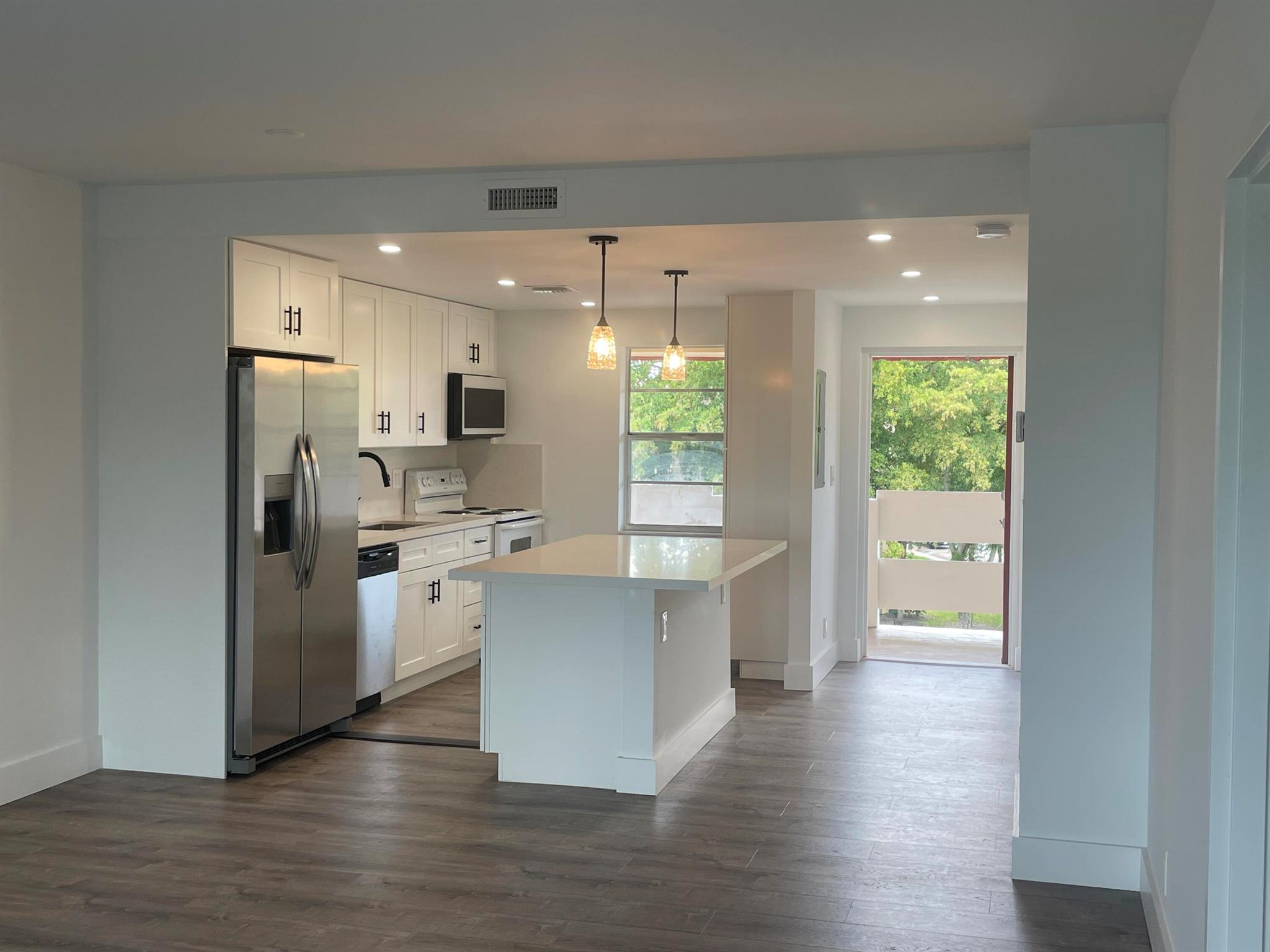 Don't miss the opportunity to live in this beautifully renovated 2 bed, 2 bath unit with screened patio in the sought-after Oriole Golf & Tennis Club. This fully renovated, move-in-ready unit offers golf course views, a split-bedroom layout, an open kitchen with stainless steel appliances, luxury vinyl flooring throughout, and new A/C, water heater, and Samsung microwave.Located in a 55+ community with resort-style amenities including two swimming pools, clubhouse, fitness center, indoor pickleball, billiards, library, card room, BBQ grills, bocce ball, and shuffleboard. The only thing missing is YOU!