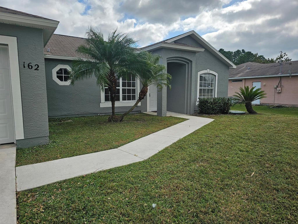 Photo of 162 SW Grimaldo Terrace, Port Saint Lucie, FL 34984 (MLS # R11039059)