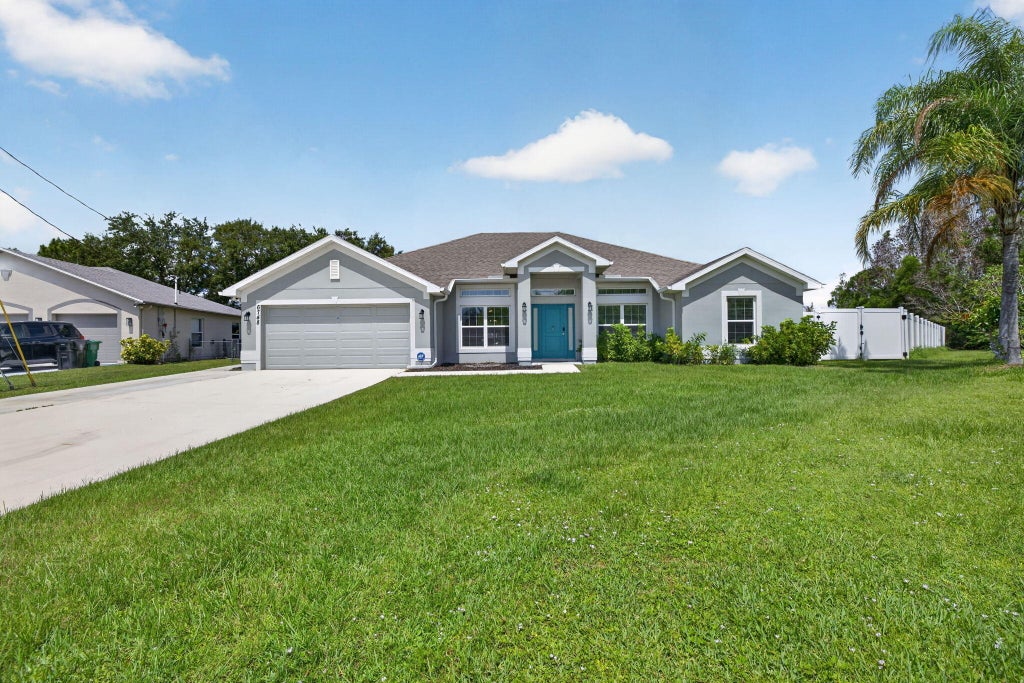 Photo of 6748 NW Mamie Court, Port Saint Lucie, FL 34983 (MLS # B26040797)