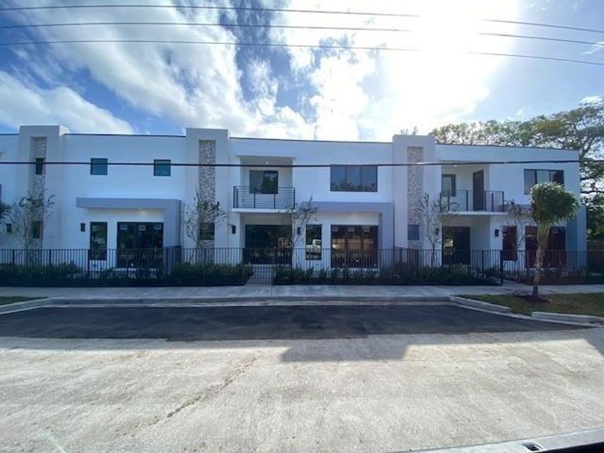 New construction townhomes in the center of it all. 3bed 2 and a half contemporary townhome with 2 car garage.  A stone throw from the beach, downtown, wilton manors and I-95.  Master bedroom with balcony. Private fenced with patio.  High quality, modern finishes.