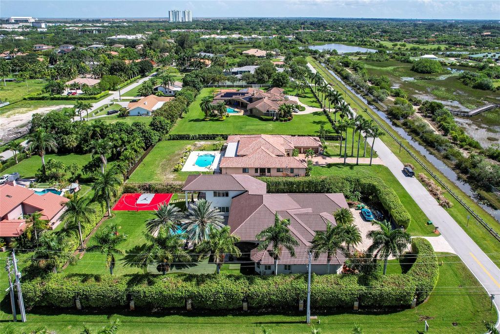 Photo of 1203 NW 121st Ave, Plantation, FL 33323 (MLS # F10542342)