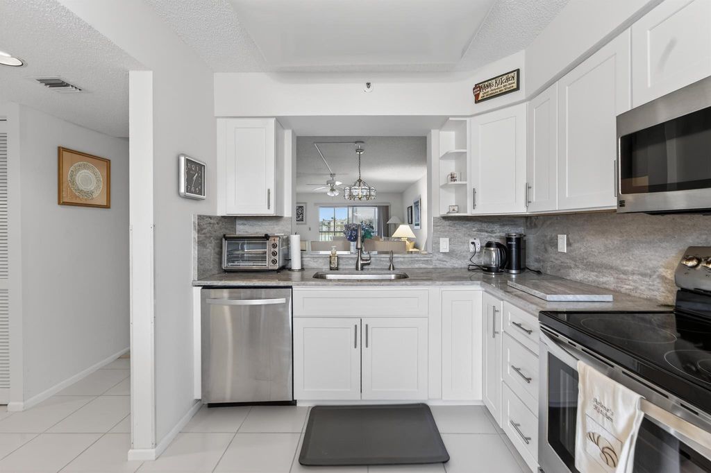 Photo of 6269 Pointe Regal Circle #309, Delray Beach, FL 33484 (MLS # R11149142)