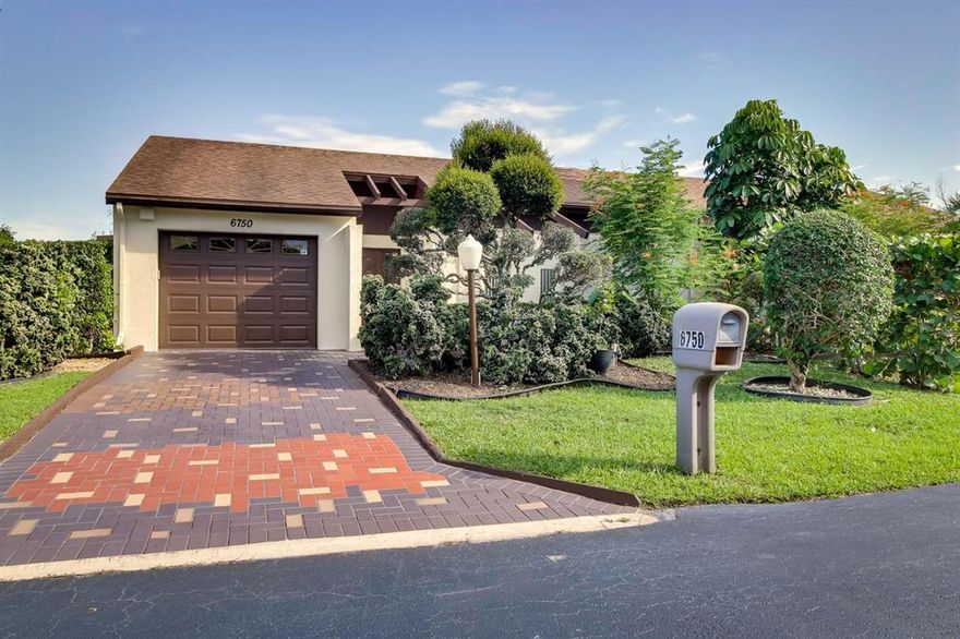 A rarely available Patio Home in Poinciana Country Club has 2 bedrooms, 2.5 baths, and a 1 car garage can be yours!   The home sits on a corner lot with beautiful tropical plants and a custom paved driveway.   As you walk into the home you will be pleasantly surprised to see marble floors throughout the home and see custom mirrors in the hall.  A unique and glamorous ½ bath is hidden behind the mirrors. To the right is the family room with tons of light that is opened to the eat in kitchen, snack bar and access to your very private interior courtyard. The extremely large living room opens onto a private courtyard and a private screened patio overlooking your very own private garden.   Master bedroom is spacious with tons of closets and master bath has walk in shower. Second bedroom also has sliders that go out to the private courtyard.   This villa was painted inside and outside include the garage freshly painted.  New hot water heater. This fabulous furnished home is a must see!  Subdivision has its own pool and is close to Poinciana Clubhouse that has pool, tennis, pay as you play golf, Mel's Restaurant, exercise room, movies, shows and much more.