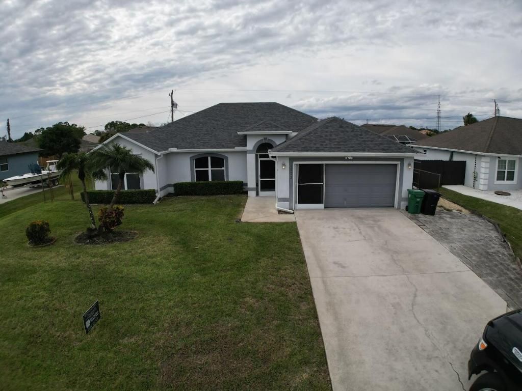 Photo of 1772 SW Bonanza Street, Port Saint Lucie, FL 34953 (MLS # R11155507)