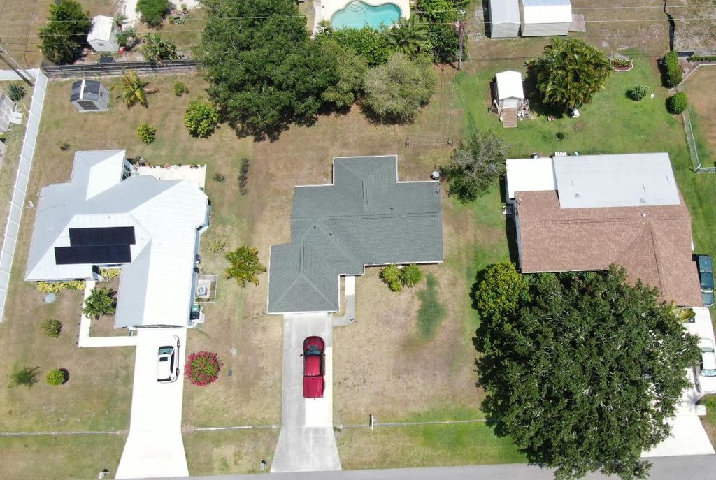 Photo of 4404 NW Brownell Terrace, Port Saint Lucie, FL 34953 (MLS # R10988745)