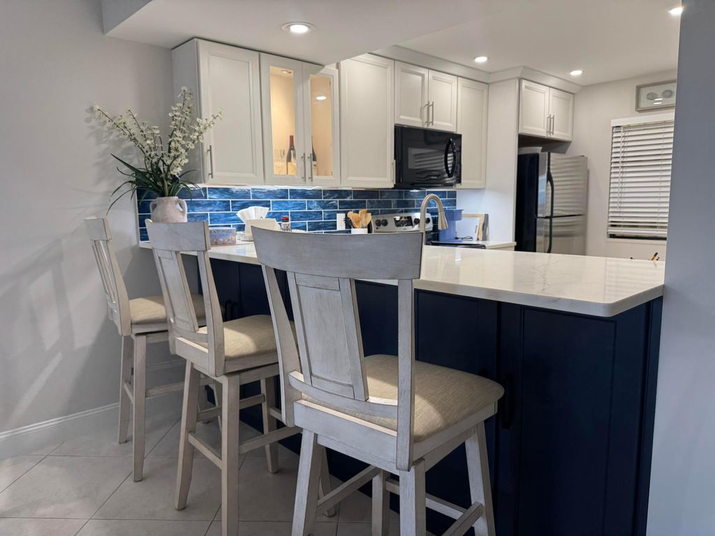 Photo of 401 Ocean Bluffs Boulevard #303, Jupiter, FL 33477 (MLS # B26021893)