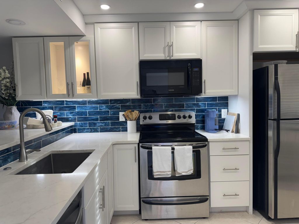 Photo of 401 Ocean Bluffs Boulevard #303, Jupiter, FL 33477 (MLS # B26021893)