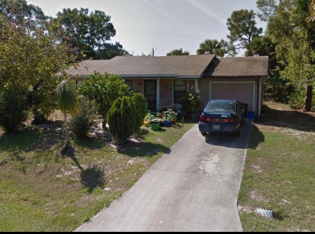Photo of 1166 SW ELEUTHERA Avenue, Port Saint Lucie, FL 34953 (MLS # B26064794)