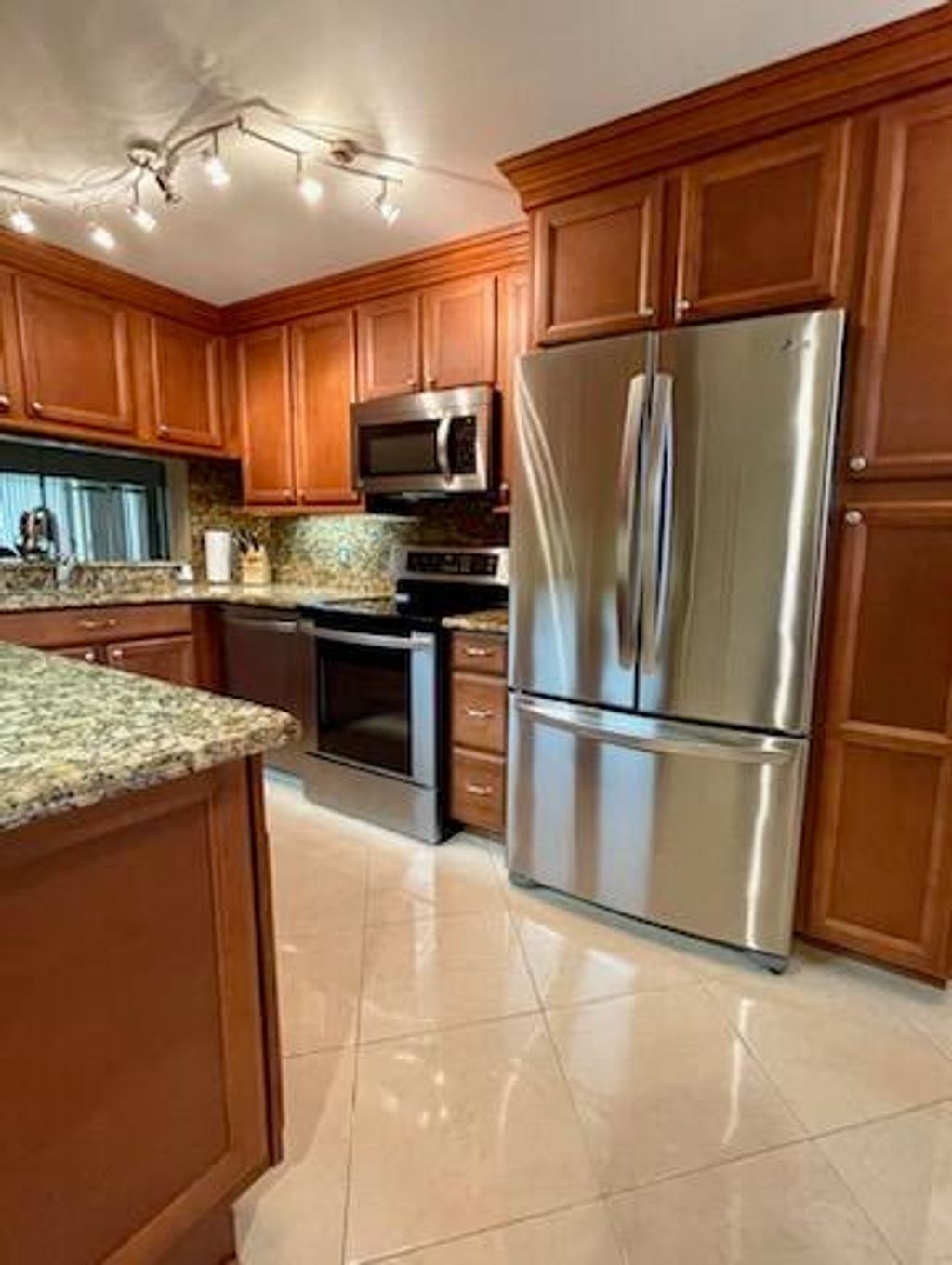 Photo of 101 Pinecrest Circle #E, Jupiter, FL 33458 (MLS # R10959241)