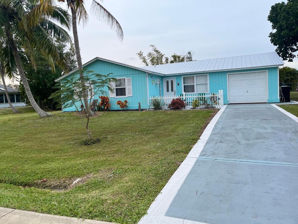 Photo of 201 SW Thornhill Drive, Port Saint Lucie, FL 34984 (MLS # R10943124)