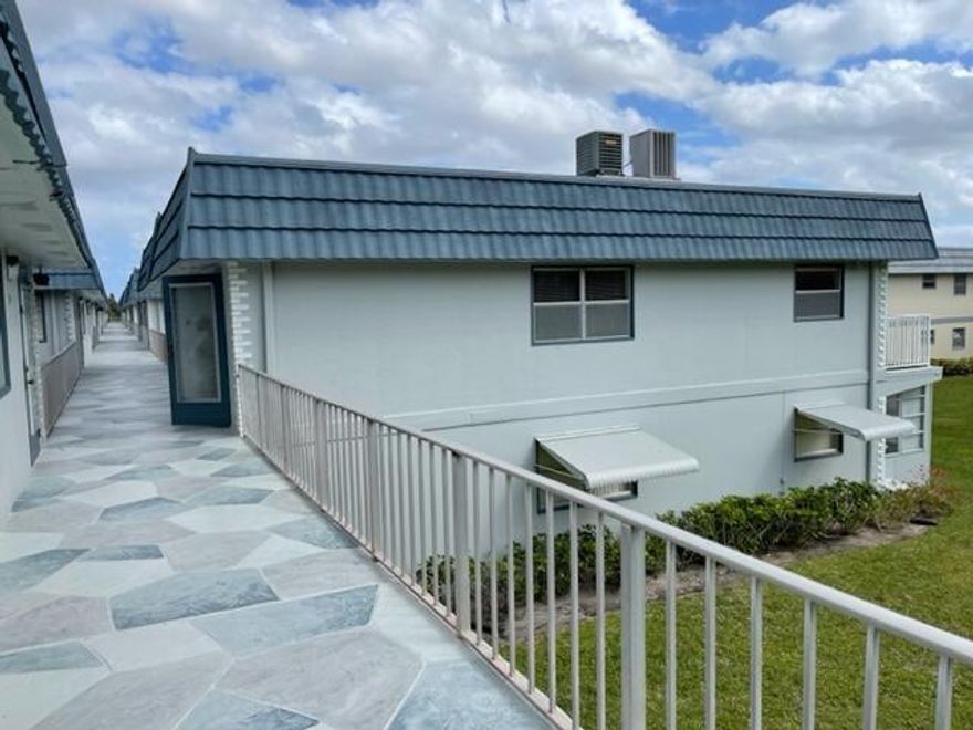 Second floor , corner unit with a garden view.. Clubhouse with shows, fitness center, movies, library and so much more. Close to all shopping, restaurants, downtown and beaches...Minutes away from Florida Turnpike and 1-95....