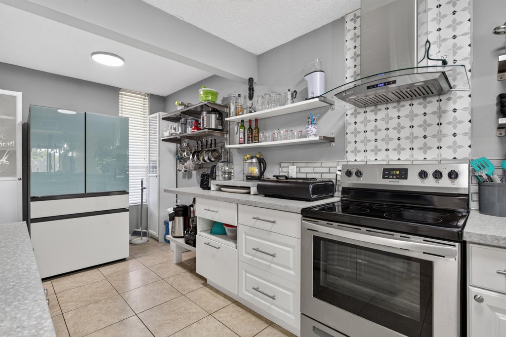 Photo of 5626 Coral Lake Drive #302, Margate, FL 33063 (MLS # B26076289)