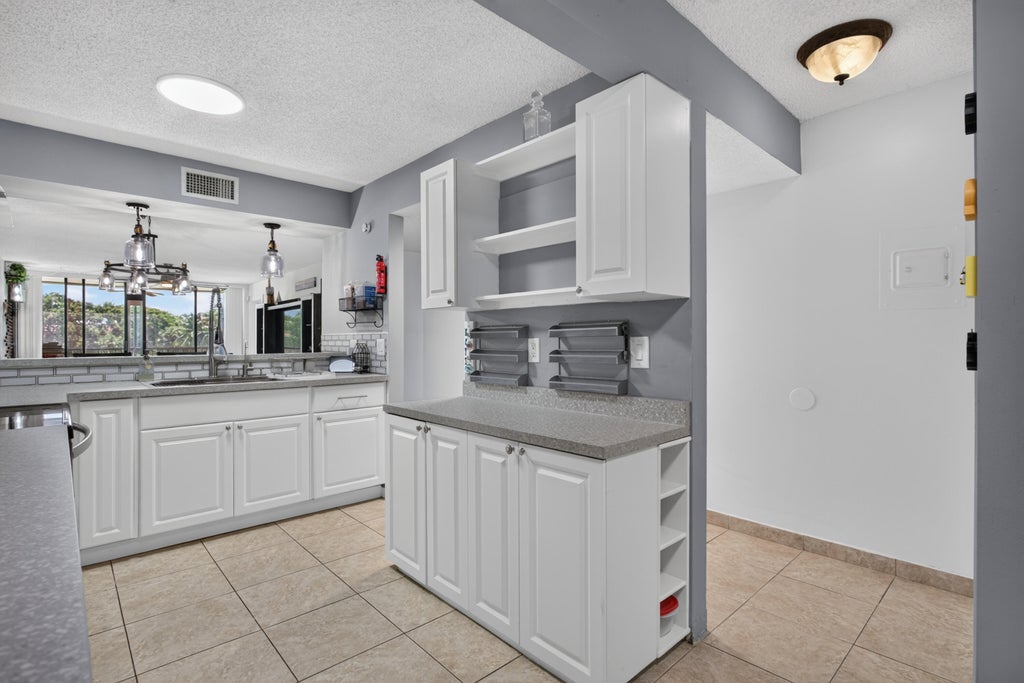 Photo of 5626 Coral Lake Drive #302, Margate, FL 33063 (MLS # B26076289)