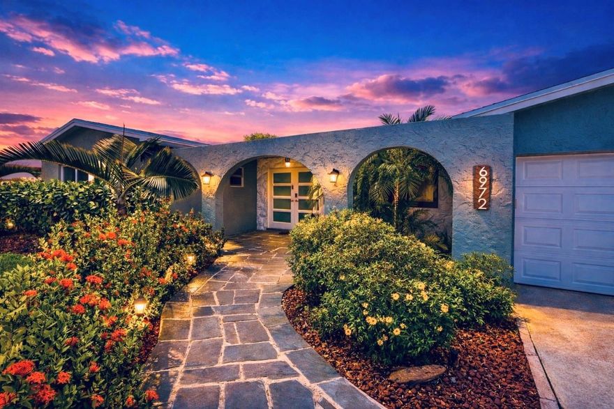 Welcome home to your sanctuary-Stunningly remodeled 3 bed 2 bath oasis updated with attention to detail! Enter through extra wide frosted estate entry doors to the expansive great room looking out to the oversized screened patio and inviting pool embraced by lush landscaping.  The open concept draws you by the cozy lounge area and into the fully updated chef’s kitchen with white shaker cabinets, SS appliances, Island range hood, coffee bar, bev fridge & granite counters then on to the oversized dining room.  Both baths are spa like retreats with herring bone marble; 1 w/luxurious steam shower w/Bluetooth audio;  1 w/soaking tub; Smart commodes w/Wireless Remotes; a mix of marble & quartzite finishes. Wood plank ceramic tile & 24" polished porcelain throughout. Newer roof, AC & WH! NO HOA!