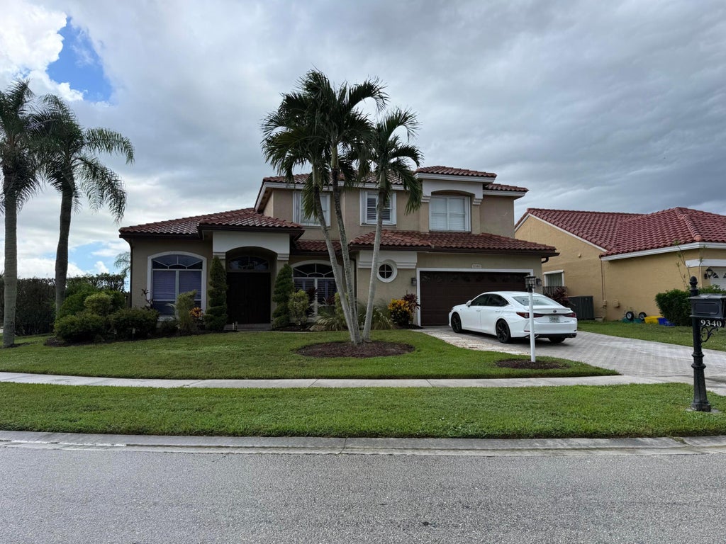 Photo of 9340 Lake Serena Drive, Boca Raton, FL 33496 (MLS # B26069497)