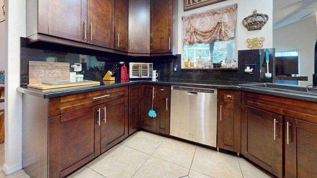 Photo of 2398 SE Charleston Drive, Port Saint Lucie, FL 34952 (MLS # R11148925)