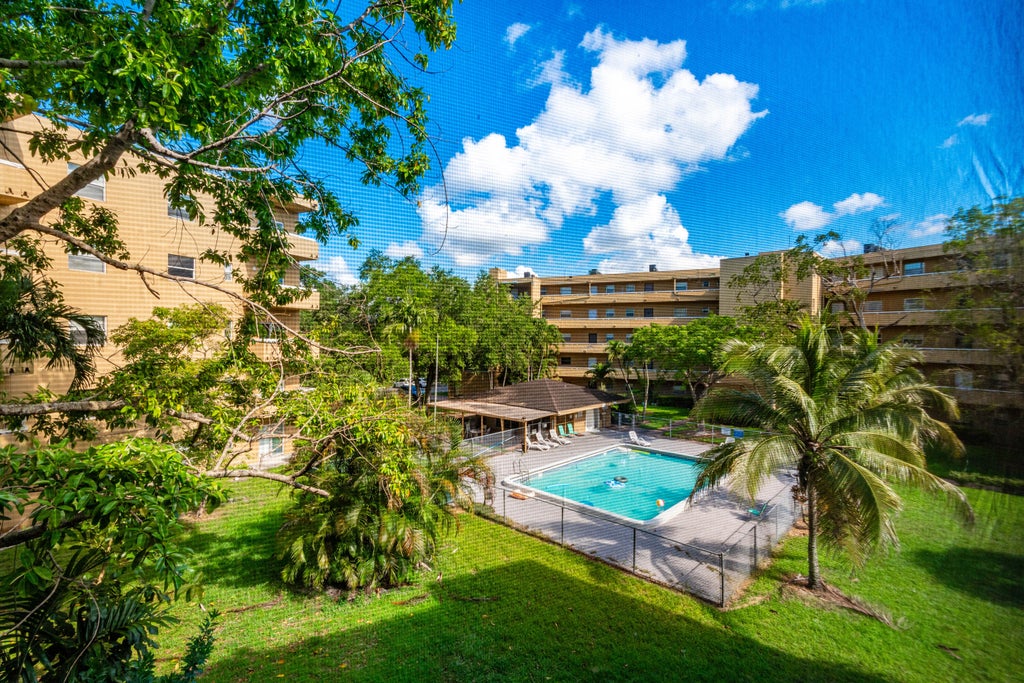 Photo of 5790 STIRLING Road #308, Hollywood, FL 33021 (MLS # B26078911)
