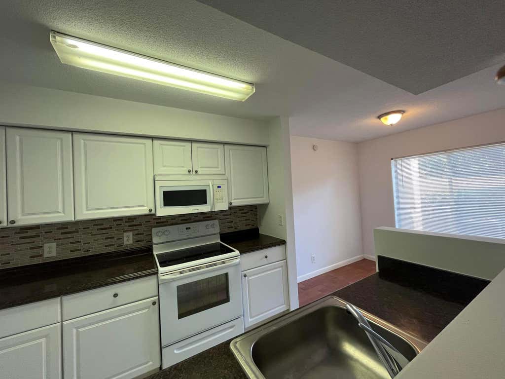Photo of 815 W Boynton Beach Boulevard #2-102, Boynton Beach, FL 33426 (MLS # R11029781)
