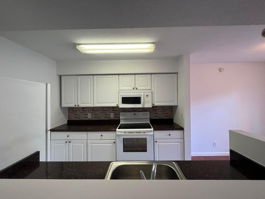 Photo of 815 W Boynton Beach Boulevard #2-102, Boynton Beach, FL 33426 (MLS # R11029781)