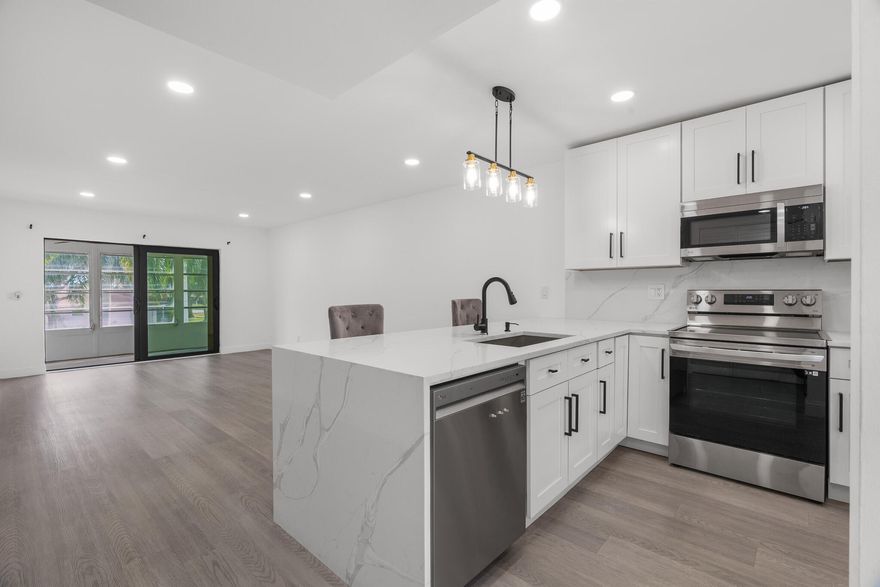 Beautifully renovated 2 bedroom 2 bath condo in the desirable 55+ community Abbey Village in Delray Beach. Second floor unit with no neighbors above that has a split floor plan. An abundant of natural light. Kitchen boasts an open concept design with new stainless steel appliances and quartz countertops! Renovated bathrooms. Impact sliding glass door leading you out to your private balcony! New fixtures. 2024 ac unit and water heater. New vinyl flooring. Common laundry room just a few doors down. 

Residents enjoy two pools, a clubhouse, fitness center, library, shuffleboard, game room, sauna, organized activities and much more! Cable TV, WIFI, and water included! A wonderful place to call home! Close to the Turnpike, Downtown Atlantic Ave, shopping, restaurants, and beaches.