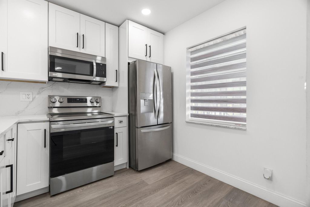 Photo of 5 Abbey Lane #207, Delray Beach, FL 33446 (MLS # R11162842)