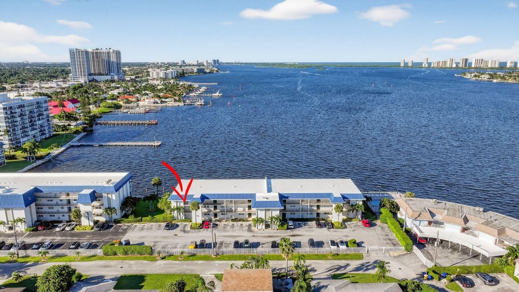 Photo of 400 Wilma Circle #301, Riviera Beach, FL 33404 (MLS # R11131895)