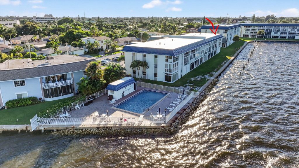 Photo of 400 Wilma Circle #301, Riviera Beach, FL 33404 (MLS # R11131895)