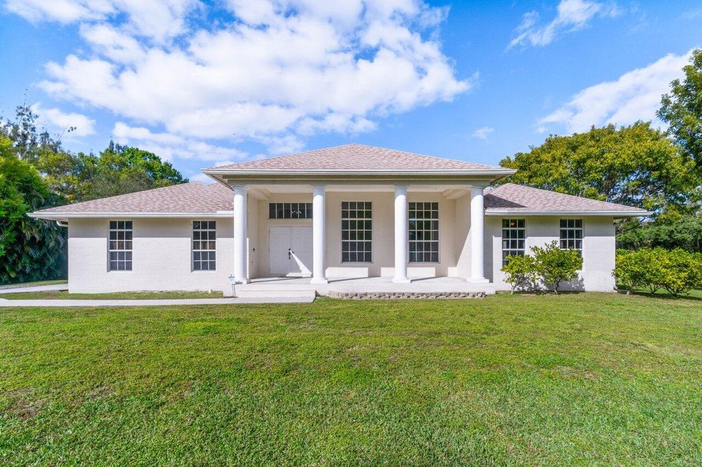 Photo of 16033 E Burns Drive, Loxahatchee, FL 33470 (MLS # R10958279)