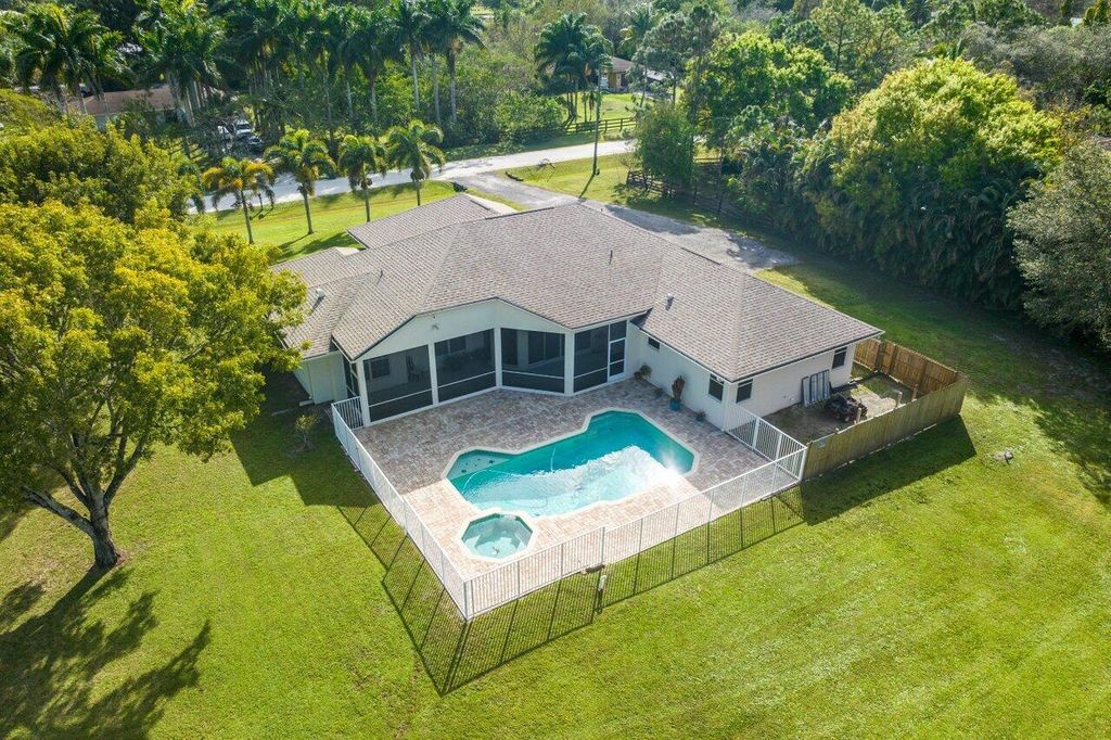 Photo of 16033 E Burns Drive, Loxahatchee, FL 33470 (MLS # R10958279)