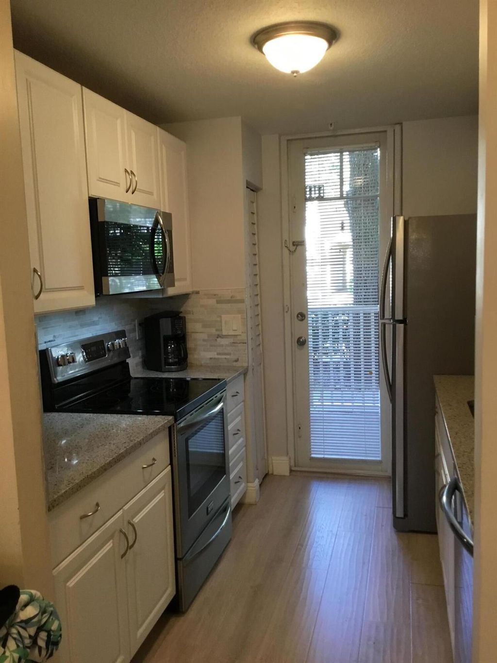 Photo of 4775 Chancellor Drive #11, Jupiter, FL 33458 (MLS # R11111647)