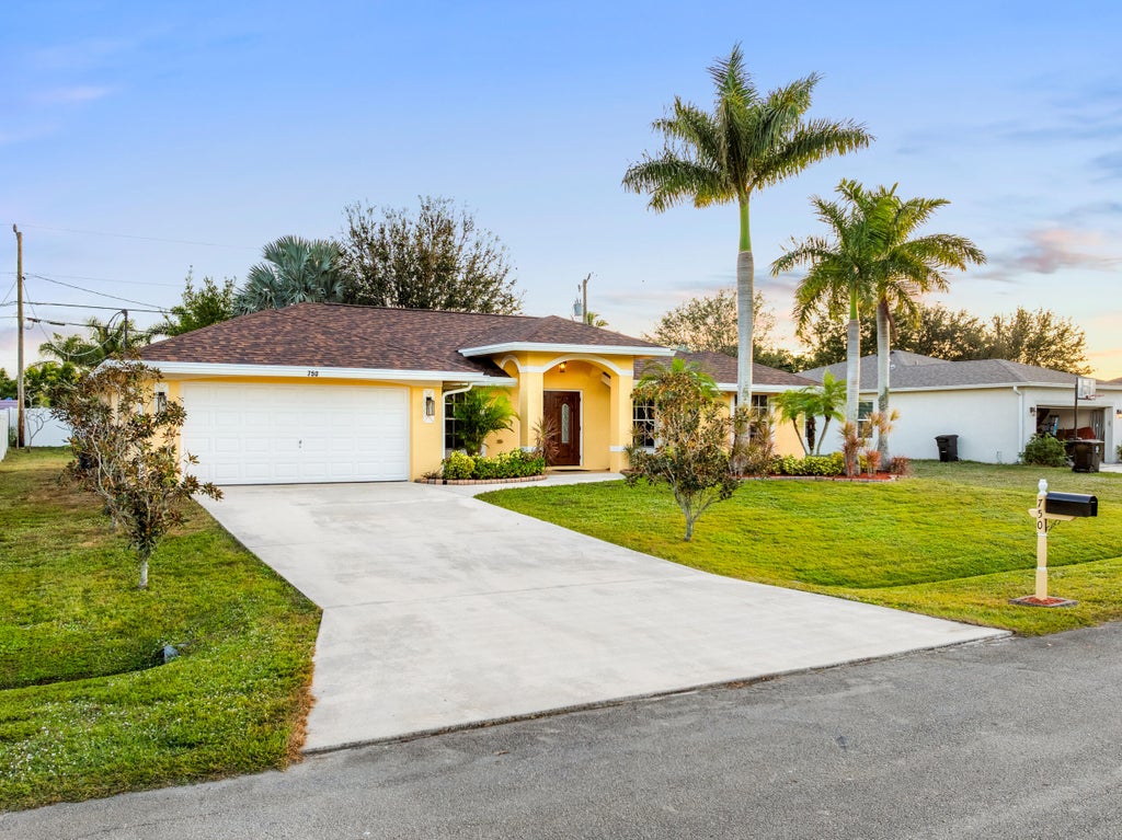 Photo of 750 SW Mccullough Avenue, Port Saint Lucie, FL 34953 (MLS # R11043992)
