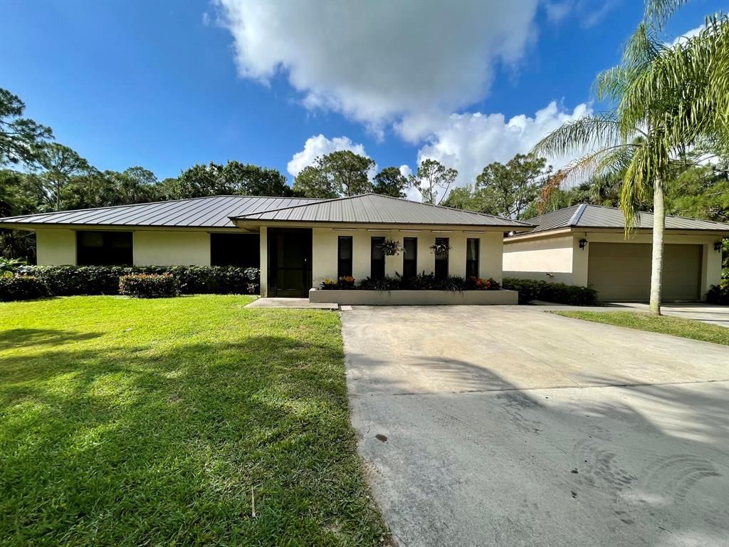 Photo of 9268 165th Place N, Jupiter, FL 33478 (MLS # R10782700)