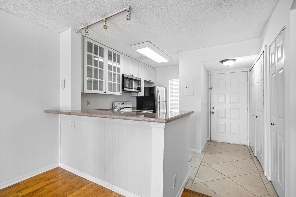 Photo of 2230 N Cypress Bend Drive #405, Pompano Beach, FL 33069 (MLS # R11076041)